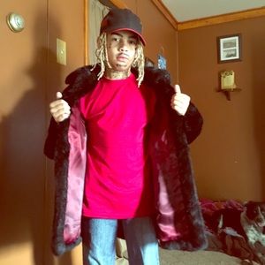 100 % real rabbit fur jacket with leather belt.